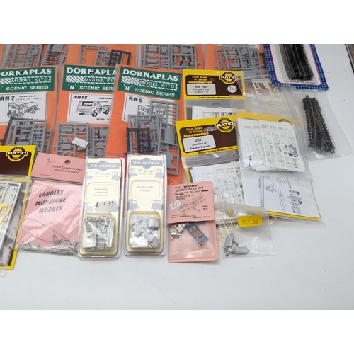 318 - Large Group N Gauge Railway Accessories, Points, Models Etc. Most Appear New & Unused