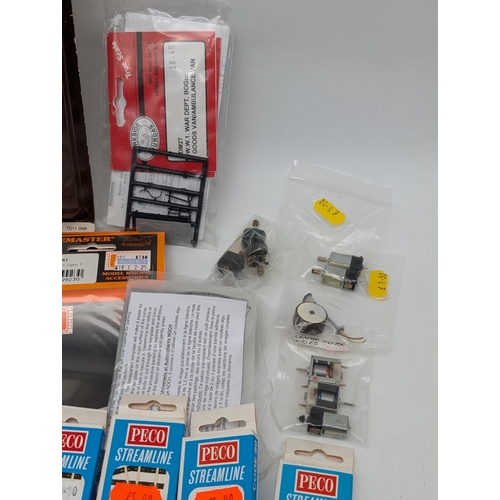 357 - N Gauge Accessory Bundle. Signs, Peco Track, Motors Etc