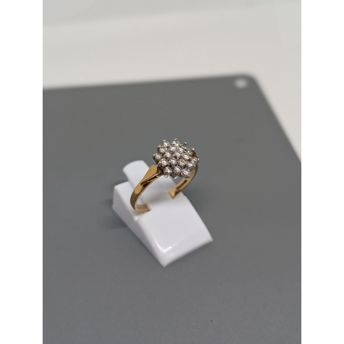 575 - 9CT Gold and Diamond Cluster Ring  Weighs 3.35g and approximate Size  N. Hallmarked.