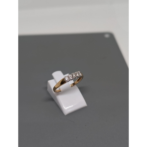 577 - 18Ct Gold and Diamond (0.2ct) Ring. Approximate Size N and weighs 1.97g.