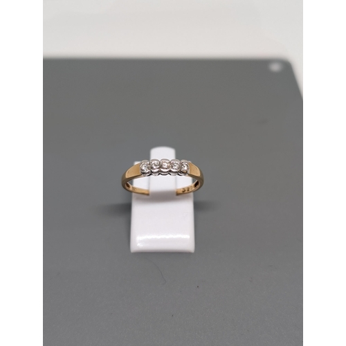 577 - 18Ct Gold and Diamond (0.2ct) Ring. Approximate Size N and weighs 1.97g.