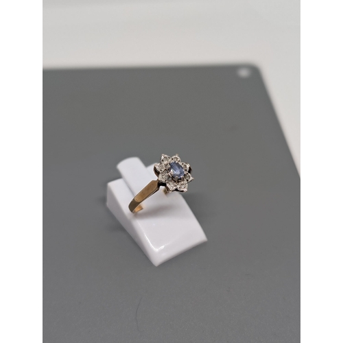 579 - 9Ct Gold and Diamond Cluster Ring. Weighing 1.5g and Approximate Size L. Hallmarked