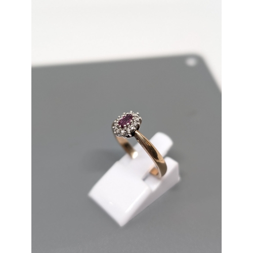 582 - Delightful 9Ct Gold, Diamond and Ruby Ring Marked LC95. Weighs 3.31g and is Approximately Size N