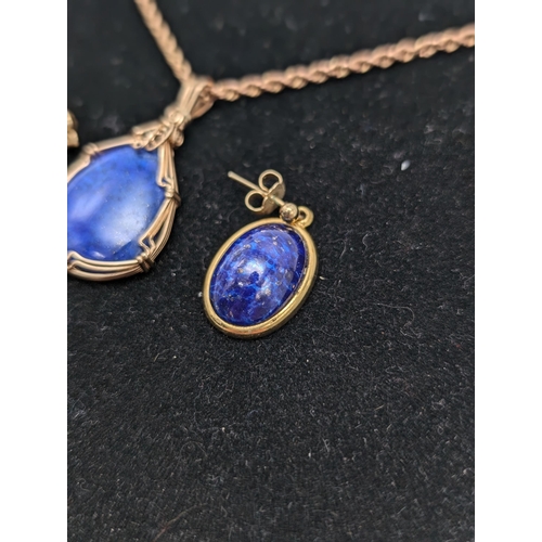 604 - 9ct Gold Chain With Attratctive Blue Stone and Similar Pair Matched Earrings (earrings unmarked) Cha... 