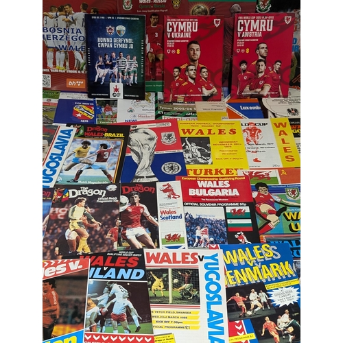 209 - Large Bundle Welsh League / Cup & International Programmes World Cup Interest Etc