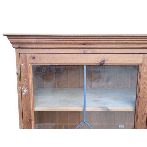 24 - Large Pine Two Door 4 drawer Display Cabinet With Leaded Glass Doors & Decorative Handles 136x109x44... 