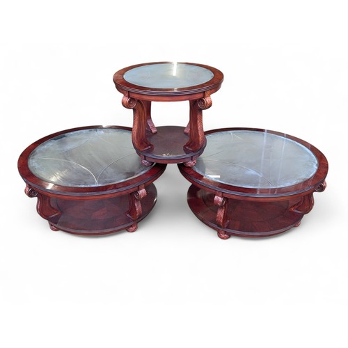 35 - A Set of 3 Round Matching Mahogany Colored Tables With Well Carved Designs and Decorative Glass Tops... 