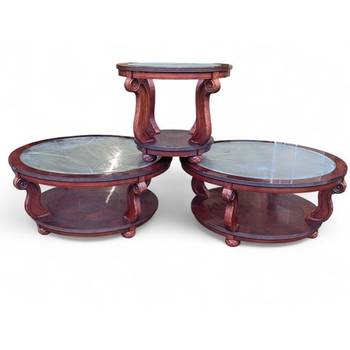 35 - A Set of 3 Round Matching Mahogany Colored Tables With Well Carved Designs and Decorative Glass Tops... 