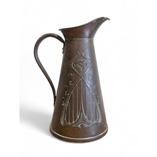 82 - A Joseph Sanky Art Art Nouveau Stylized Floral Pattern Copper Pitcher, Marked J.S&S To Base 23cm