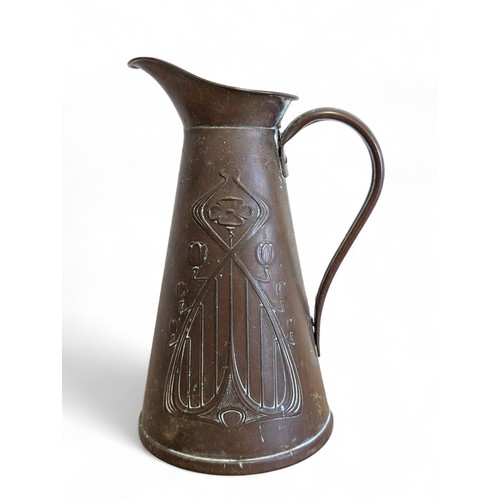 82 - A Joseph Sanky Art Art Nouveau Stylized Floral Pattern Copper Pitcher, Marked J.S&S To Base 23cm