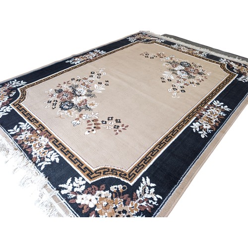 141 - Pair of Beige / Black Print Floral Rugs 167x235cm  Marked Azmiras Verso