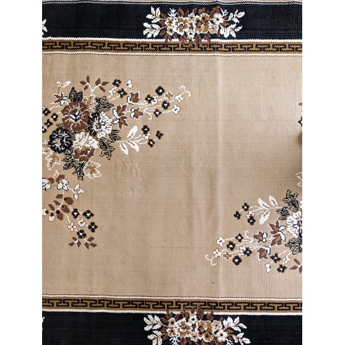 141 - Pair of Beige / Black Print Floral Rugs 167x235cm  Marked Azmiras Verso