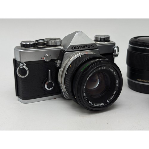 159 - Good Condition Olympus OM1 SLR Camera With 4 Lenses Plus Teleconverter, All in Good Order