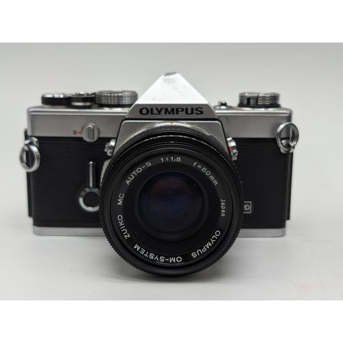 159 - Good Condition Olympus OM1 SLR Camera With 4 Lenses Plus Teleconverter, All in Good Order