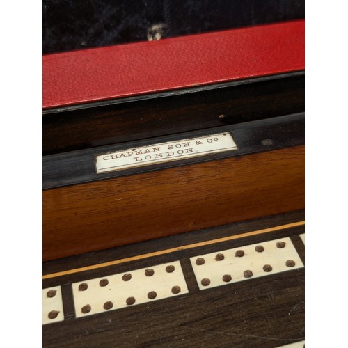 409 - A 19th century 'Royal Cabinet of Games' in a burr walnut and ebony case, of rectangular form with hi... 