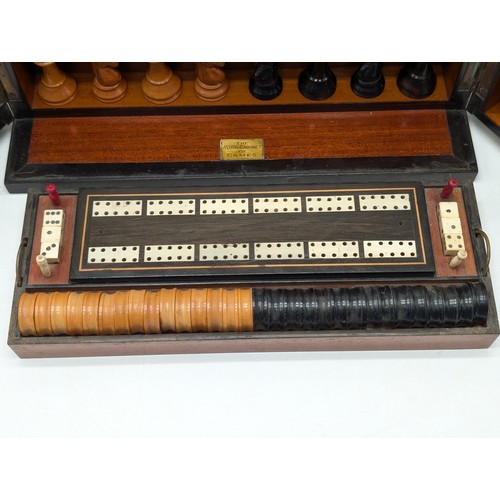 409 - A 19th century 'Royal Cabinet of Games' in a burr walnut and ebony case, of rectangular form with hi... 