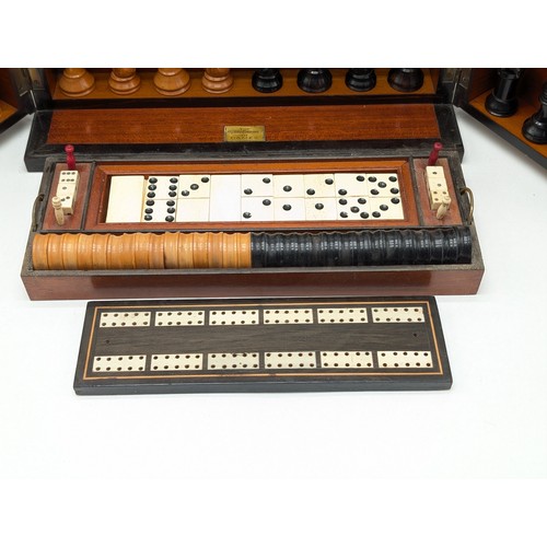 409 - A 19th century 'Royal Cabinet of Games' in a burr walnut and ebony case, of rectangular form with hi... 