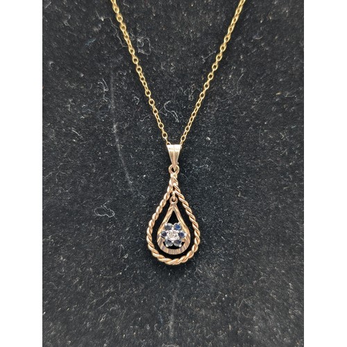 472 - 9Ct Gold Marked Chain & Pendant With Blue Stone - 2.81g