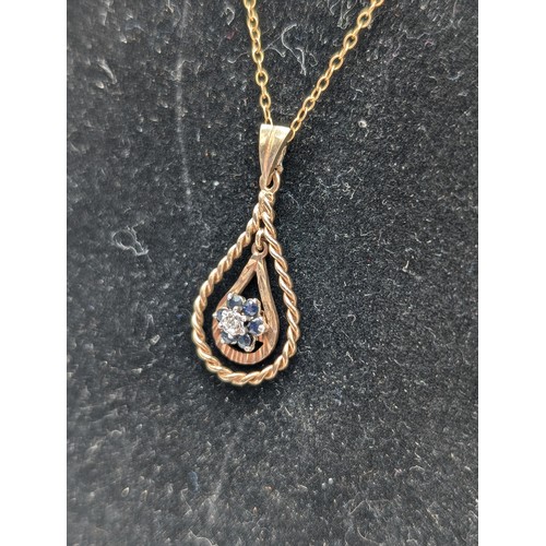 472 - 9Ct Gold Marked Chain & Pendant With Blue Stone - 2.81g