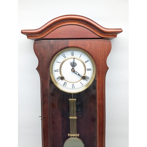 149 - Reproduction Mahogany Two Train Vienna Type Wall Clock 12x26