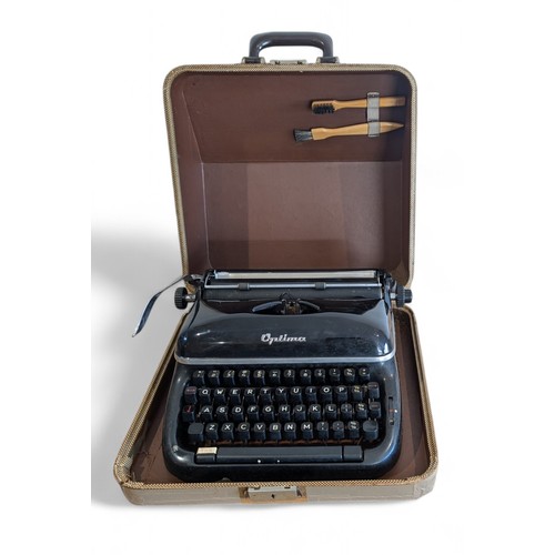 203 - An Excellent Condition Cased With Accessories and Manual Optima Elite Vintage Typewriter Original Lo... 