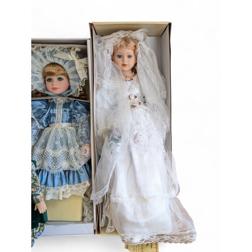 202 - A Group of 6 Boxed and New Condition Porcelain Dolls, Westminster Collection Etc Largest 20