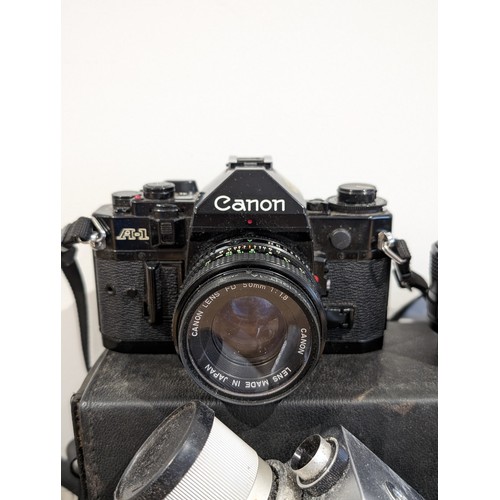 154 - A Good Vintage / Modern Camera Bundle Including Canon 1100D DSLR, Canon A-1, Canon Mil, Polaroid, Pl... 