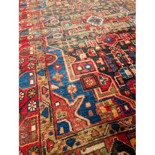 137 - A Persian Nahavand Rug 210x136 Red Ground Rug, With Wear Patches as Seen