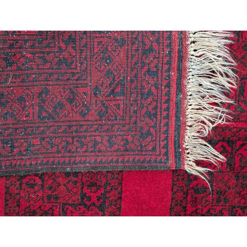 139 - Excellent Hand Knotted Afghan Carpet/ Rug with A few Ware Patches on Red Ground 120x78 inches