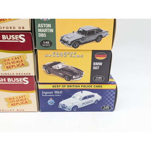 410A - Group (11) Boxed Excellent Condition Diecast Vehicles, Including 7 Great British buses, Plus atlas 1... 