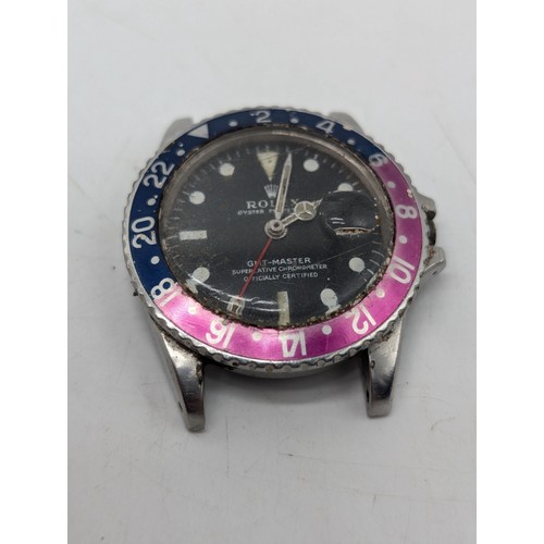 467A - 1968 Rolex GMT Master, Pepsi 1675. AF Condition, Non running with Missing Crown. Has suffered Water ... 