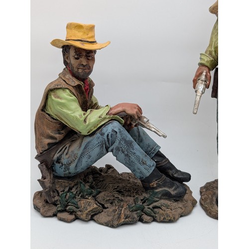 154 - Two Large Resin John Wayne Statues Tallest 20
