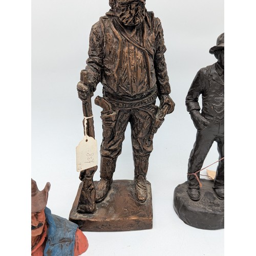 156 - Trio of Michael Garmin John Wayne Statues Plus Austin productions Cowbow Metallic Sculpture 14