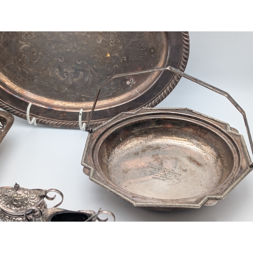 134 - Mixed Silver-Plated Wares with Coffee Bean Spoons  A mixed group of silver-plated items, including a... 