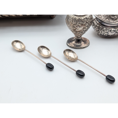 134 - Mixed Silver-Plated Wares with Coffee Bean Spoons  A mixed group of silver-plated items, including a... 