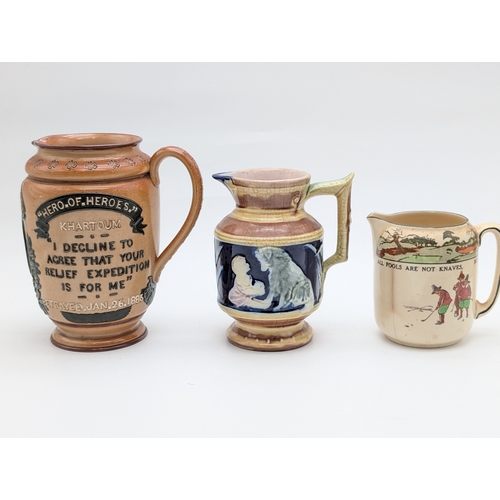 354 - Doulton Lambeth ‘General Gordon’ Commemorative Jug, Victorian Majolica Jug, and Motto Ware Jug (3)  ... 