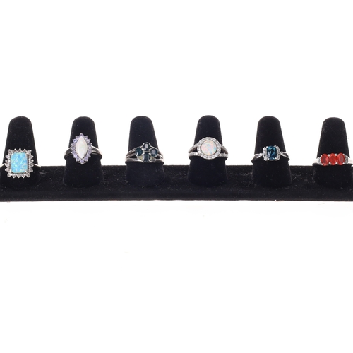 294 - Gemstone Silver Ring Collection incl. Opal, Tanzanite, London Blue Topaz, 18.9g