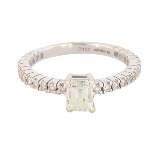 139 - Diamond Emerald Cut 18ct White Gold Solitaire Ring with Diamond Shoulders, 3.7g