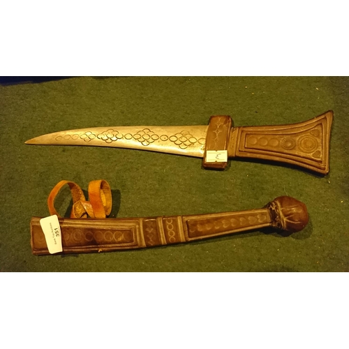 351 - Arabic Dagger in leather scabbard