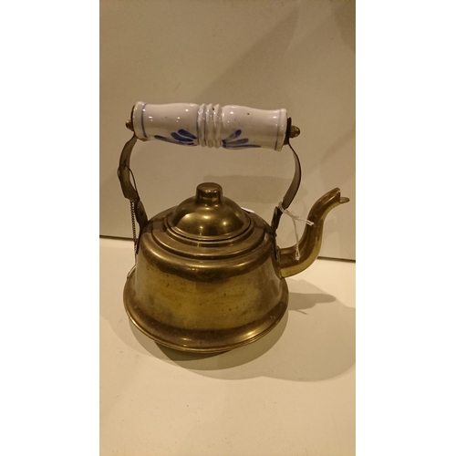 381 - Brass kettle with ceramic handle