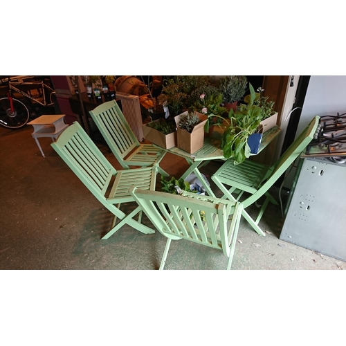 66 - green garden table with 4 matching chairs