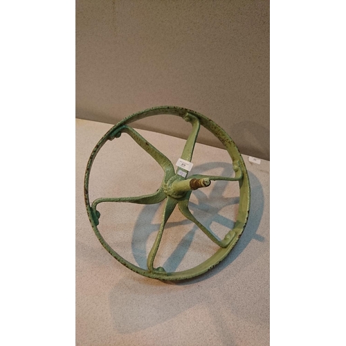 678 - Vintage cast iron wheelbarrow wheel