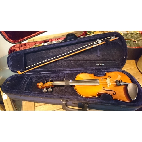 451 - Violin in case