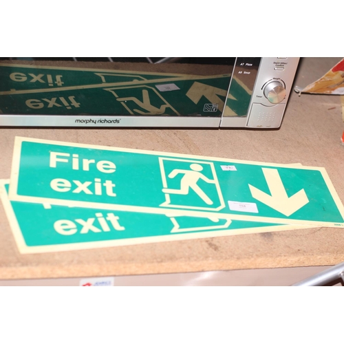 104 - 2 Fire exit signs