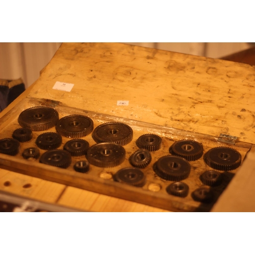 34 - Set of cogs in box