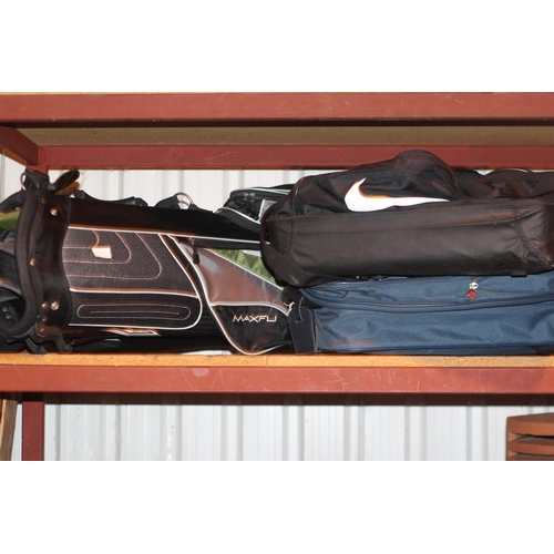 7 - Golf bag, suit case and a nike sports bag.