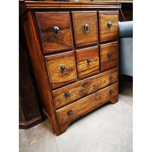 557 - Light oak six over two chest of drawers