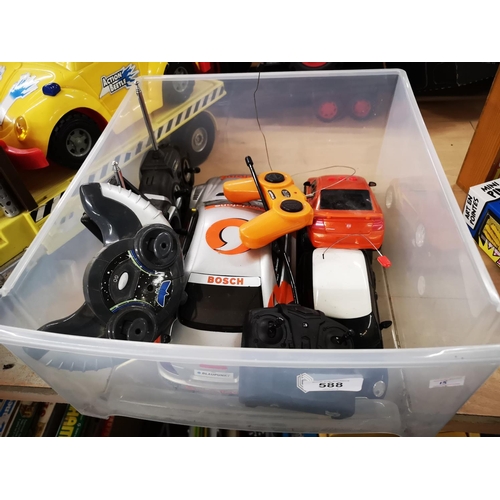 588 - Three remote control cars with various controllers