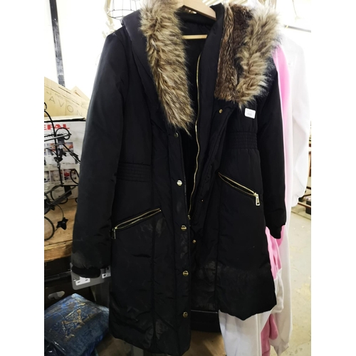 680 - Ladies parka style coat.