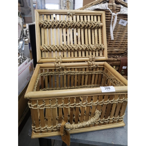 388 - Harrods wicker hamper basket with Harrods leather tag. Approx 32x24x20cm